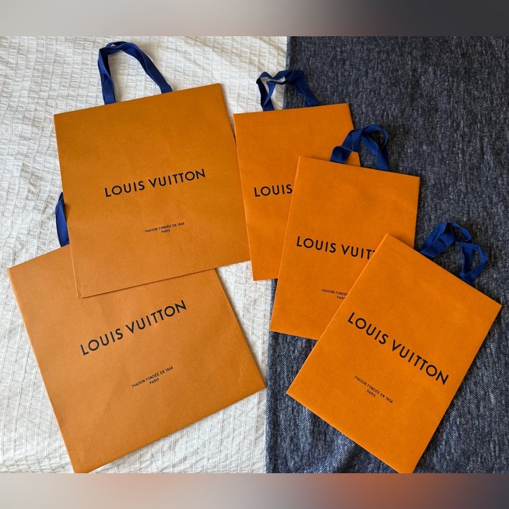 Five Louis Vuitton Shopping Bags